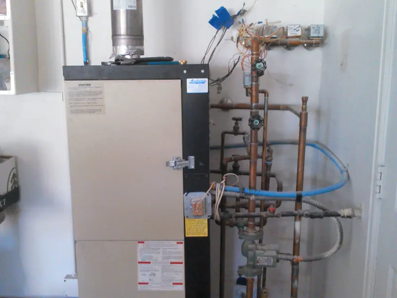 Old combination unit before replacement by Rapid City Plumbing